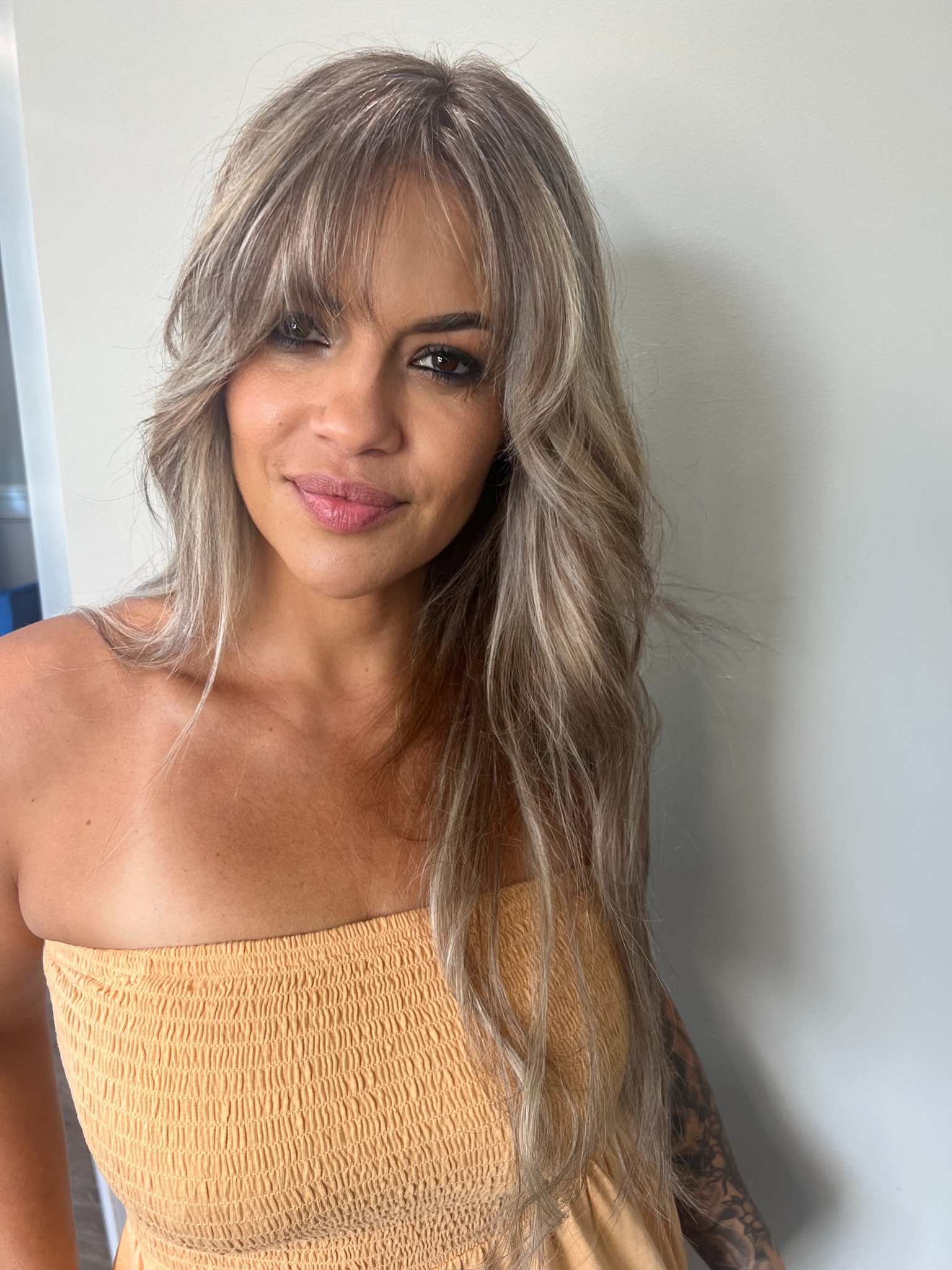 Soft layered blonde hairstyle